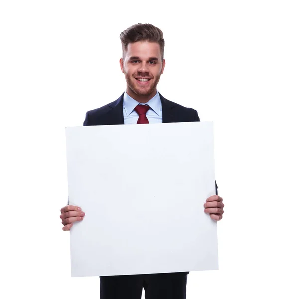 Young Unshaved Businessman Navy Suit Red Tie Holds Empty Billboard — Stock Photo, Image