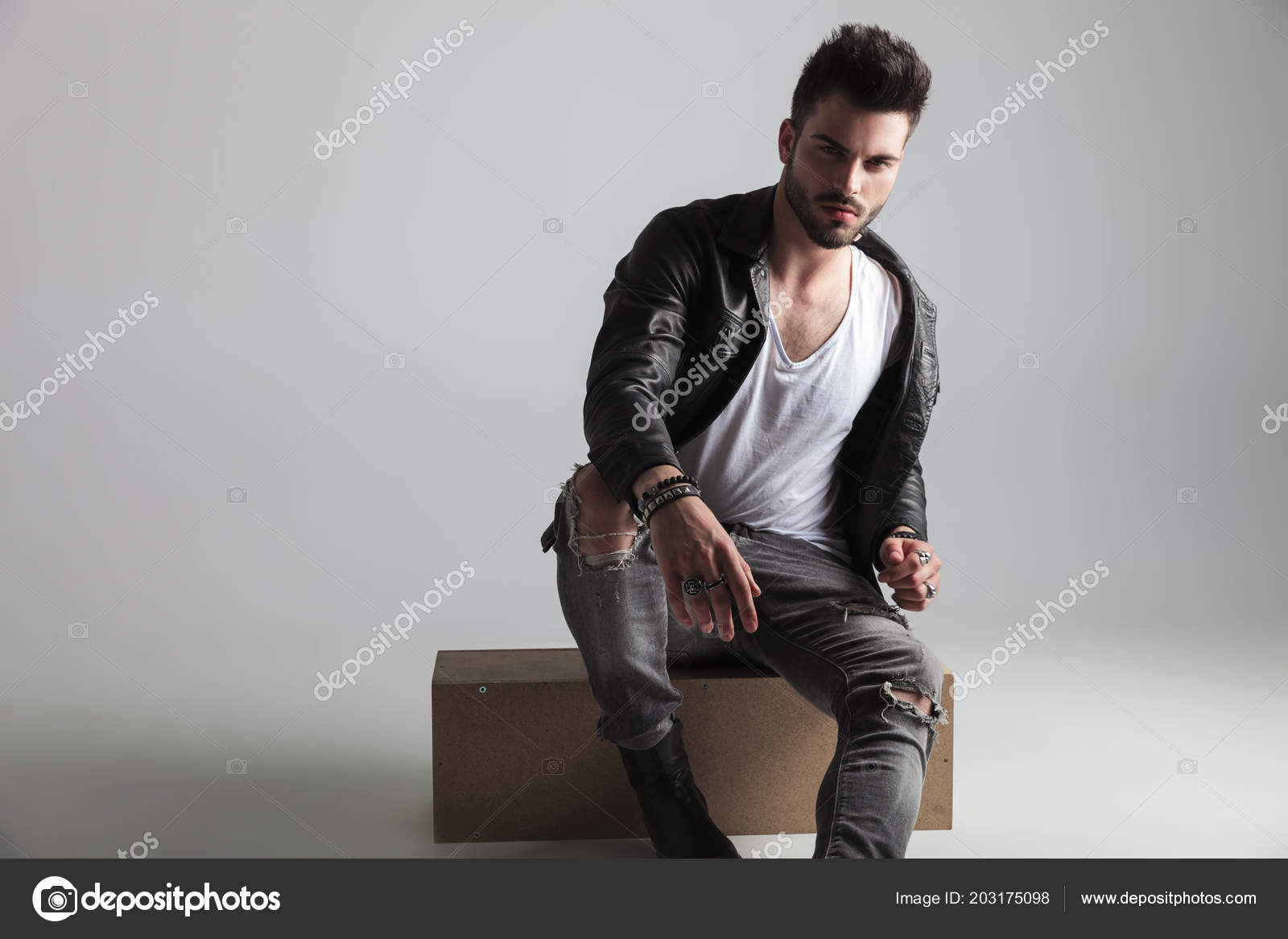 grey jeans leather jacket