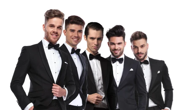 Portrait Five Attractive Men Wearing Tuxedoes Standing Line White Background — Stock Photo, Image