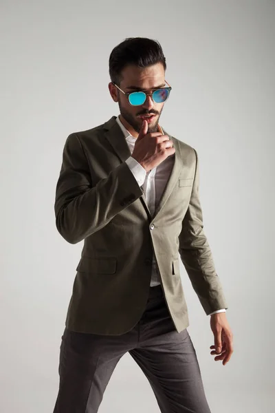 Portrait Pensive Man Wearing Sunglasses Green Suit Standing Light Grey — Stock Photo, Image