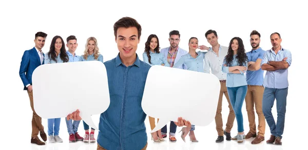 Young Casual Team Leader Holding Two Empty Speech Bubbles While — Stock Photo, Image