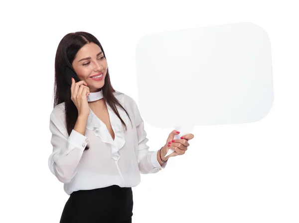 Businesswoman Talking Phone Holding Speech Bubble Looks Side While Standing — Stock Photo, Image