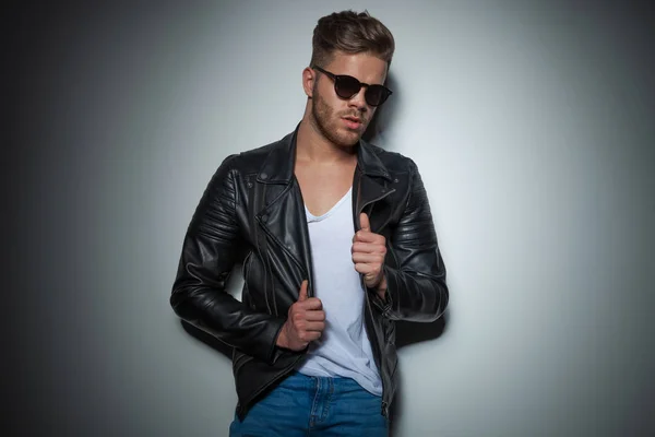 Portrait Seductive Man Sunglasses Holding His Leather Jacket Collar While — Stock Photo, Image