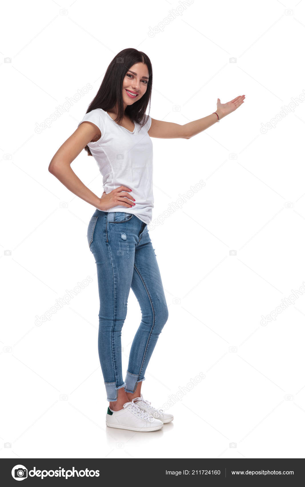Glad Lady in Casual Jeans Outfit Standing in Confident Pose during
