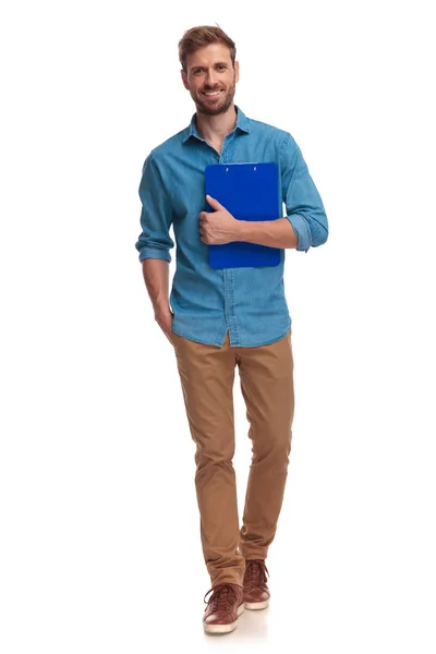 Young Casual Student Walks Forward While Holding Notepad White Backround — Stock Photo, Image