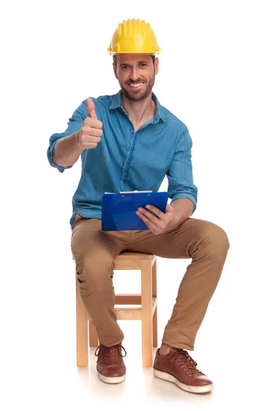 Happy Construction Engineer Making Sign While Sitting Chair White Background — Stock Photo, Image