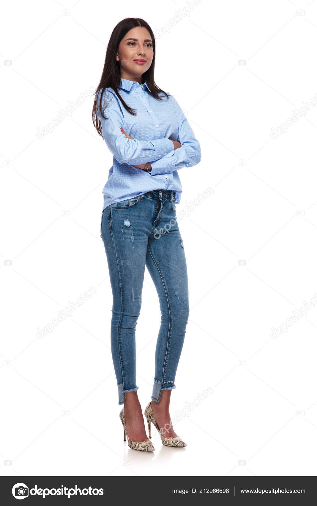 wearing a blue shirt with jeans