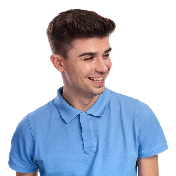 Laughing Young Casual Man Looks Side White Background — Stock Photo, Image
