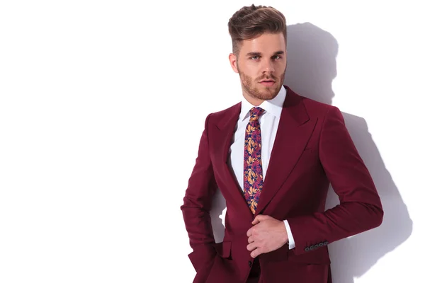 Portrait Handsome Elegant Man Buttoning His Burgundy Suit Looks Camera — Stock Photo, Image