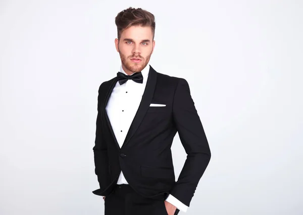 Portrait Relaxed Elegant Man Black Tuxedo Standing Light Grey Background — Stock Photo, Image