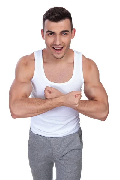 Retrato Del Hombre Excitado Camiseta Flexionando Sus Manos Mientras Está — Foto de Stock