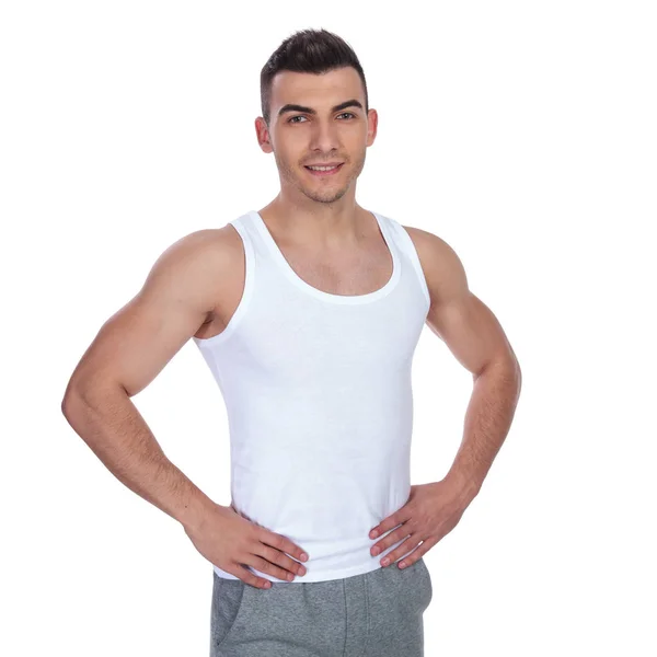 Ritratto Uomo Magro Sexy Maglietta Piedi Sfondo Bianco Mentre Tiene — Foto Stock