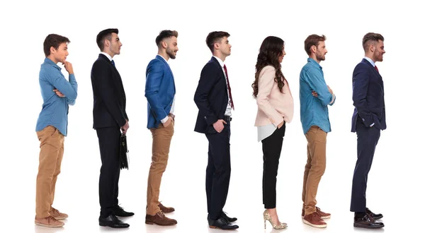 Group Seven People Different Reactions Waiting Line While Standing White — Stock Photo, Image