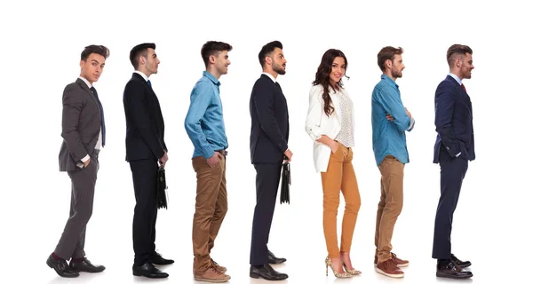 Side View Seven People Different Reactions Standing Line White Background — Stock Photo, Image
