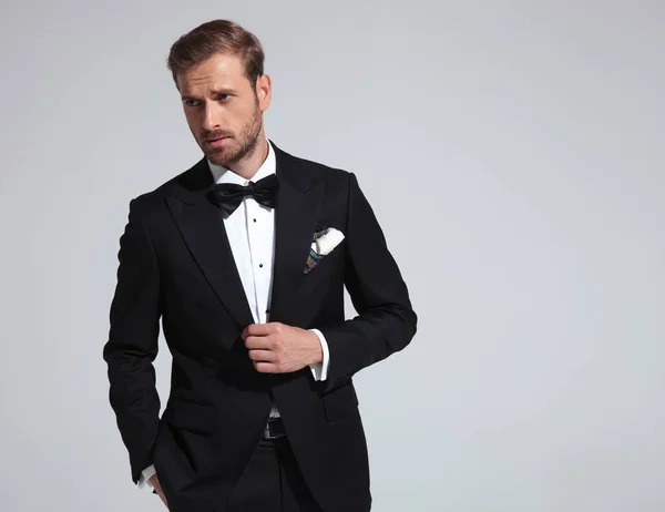 Sexy Elegant Man Wearing Tuxedo Bowtie Posing Grey Background — Stock Photo, Image