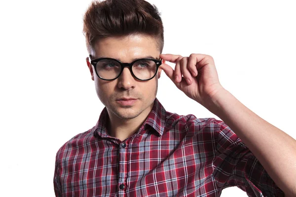 Portrait Handsome Nerd Fixing Sunglasses Looking Side While Standing White — Stock Photo, Image