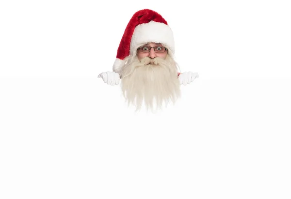 Weihnachtsmann Kopf Blickt Auf Weißem Hintergrund Über Weiße Tafel — Stockfoto