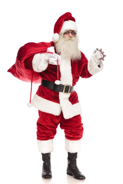 Happy Santa Claus Holding Red Bag Ringing His Bell While — Stock Photo, Image