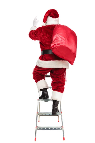 Vista Trasera Santa Claus Con Saco Hombro Subiendo Una Escalera —  Fotos de Stock