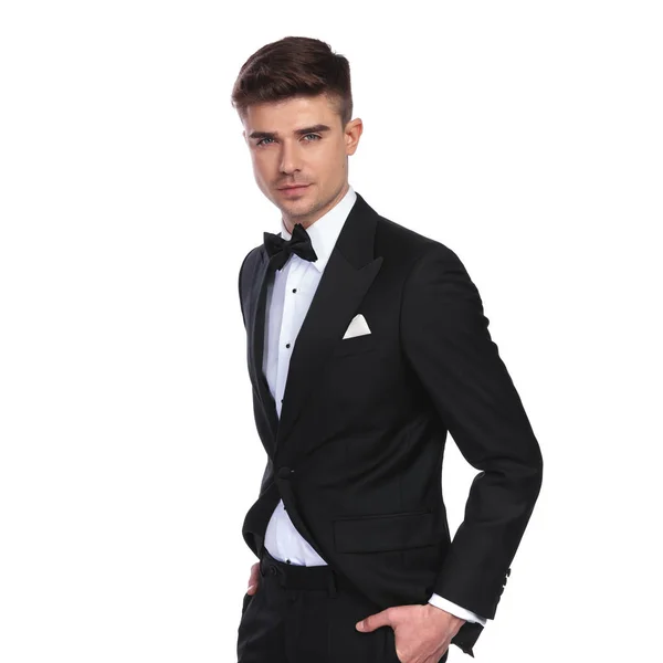 Portrait Young Elegant Man Wearing Black Tuxedo Bowtie Standing White — Stock Photo, Image