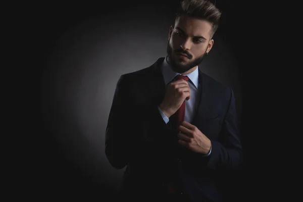 Portrait Handsome Businessman Fixing Red Tie Looking Side While Standing — Stock Photo, Image