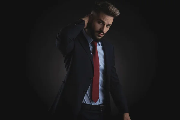 Portrait Young Businessman Navy Suit Red Tie Holding Back Head — Stock Photo, Image