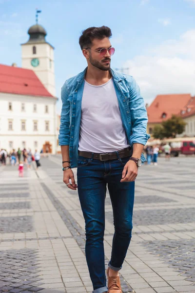 Young Casual Man Stepping Forward City Streets Looks Side Full — Stock Photo, Image
