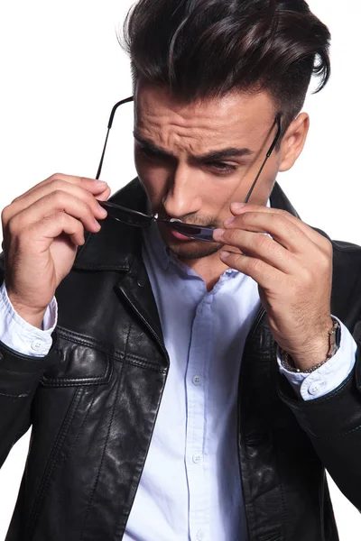 Sexy Businessman Puts Sunglasses Looks Side While Standing White Background — Stock Photo, Image