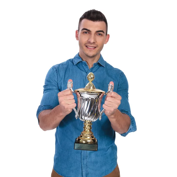 Portrait Smiling Casual Man Offering Winning Trophy While Standing White — Stock Fotó