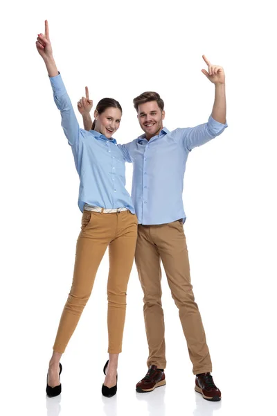 Happy Casual Couple Celebrating Success Hands Air White Background — Stock Photo, Image