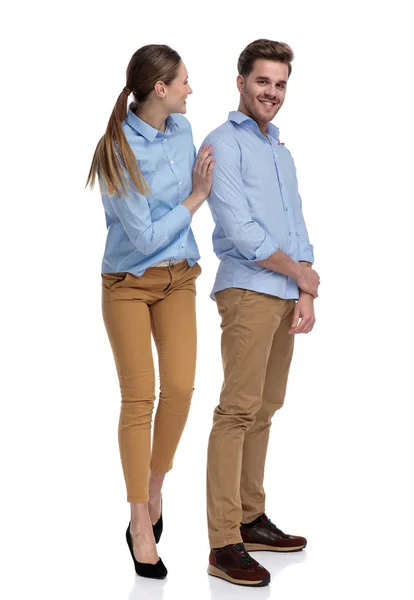 Laughing Casual Woman Standing Man Holding His Shoulders White Background — Stock Photo, Image