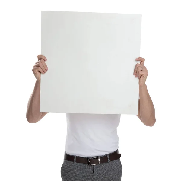 Joven Hombre Casual Cubriendo Cara Con Cartelera Blanco Sobre Fondo —  Fotos de Stock