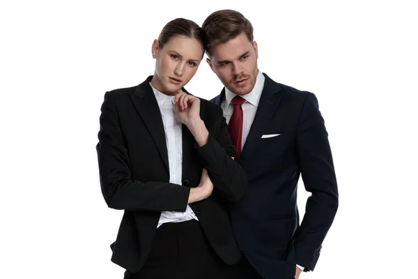 Couple in business suits thinking — Stock Photo, Image