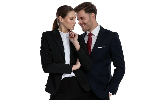 Couple in business suits thikning — Stock Photo, Image