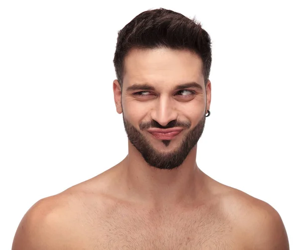 Funny topless guy with beard looking away — Stock Photo, Image