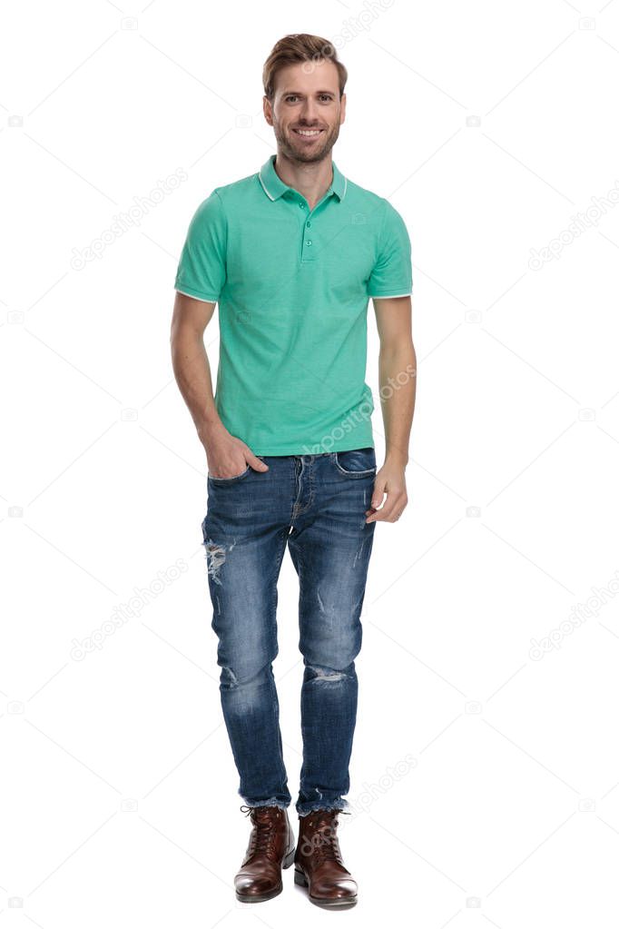 modern man standing with hand in pocket