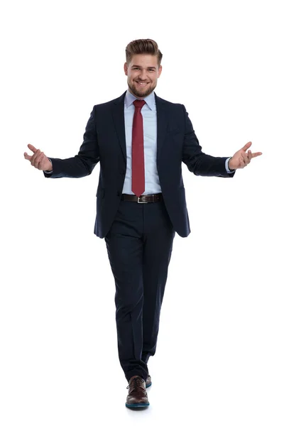 Happy businessman walking and welcoming — Stock Photo, Image