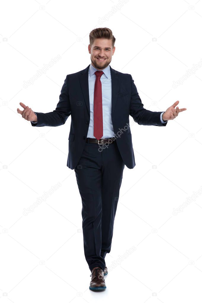 Happy businessman walking and welcoming 
