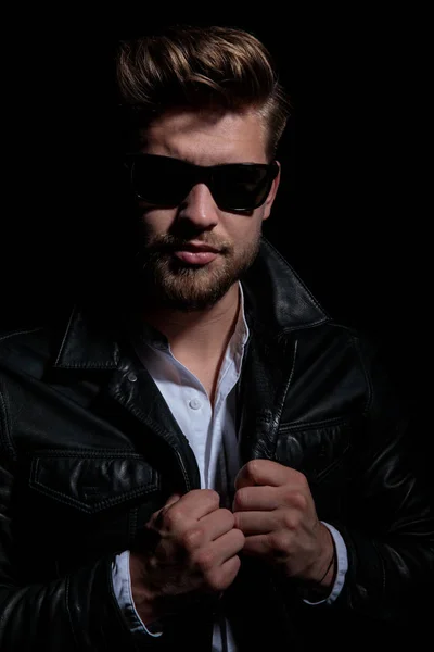 Portrait of a serious young man in leather jacket — Stock Photo, Image