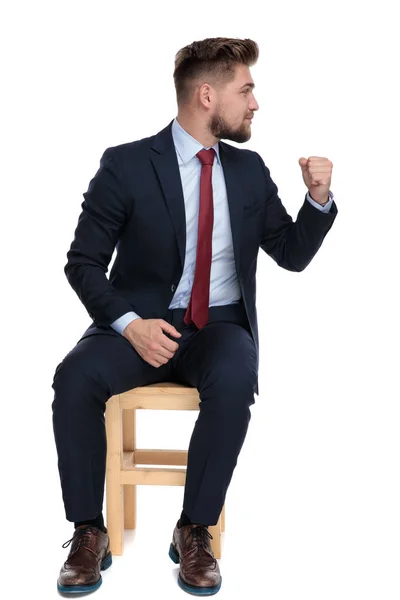 Happy young business man celebrating victory on white background — Stock Photo, Image