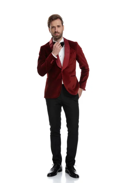 Fashion model wearing red velvet tuxedo and black bowtie — Stock Photo, Image