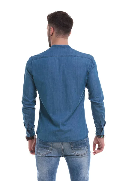 Rear view of a confident casual man looking away — Stock Photo, Image