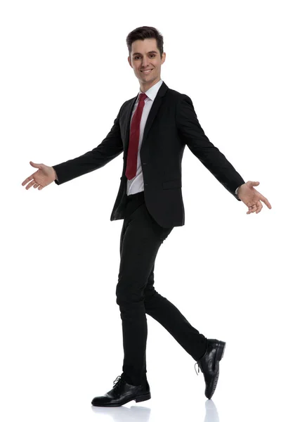 Side view of a cheerful businessman welcoming — Stock Photo, Image