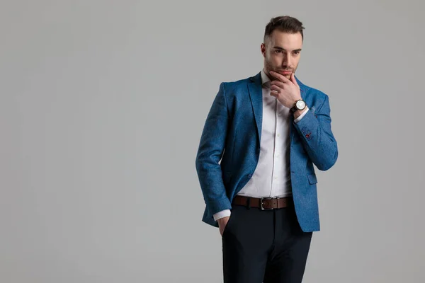 Thoughtful Young Smartcasual Guy Holding Hand Chin Thinking Looking Side — Stock Photo, Image