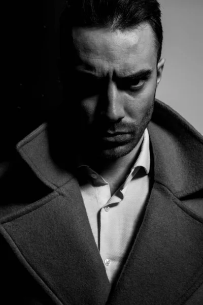 Dramatic Young Man Wearing Long Coat Standing Shadow Black Grey — Stock Photo, Image