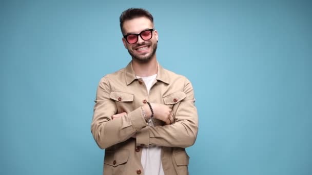 Happy Young Fashion Man Wearing Jacket Smiling Making Cutting Sign — Stock Video