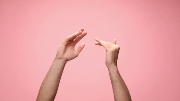 Young Man Holding Hands Air Moving Gesturing Dancing Pink Background — Stock Video