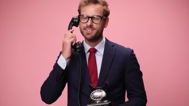 Elegant Young Businessman Wearing Glasses Answering Old Rotary Telephone Getting — Stock Video
