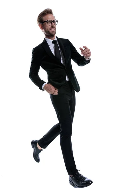 Smiling Elegant Man Black Suit Holding Hands Fashion Pose Marching — Stock Photo, Image