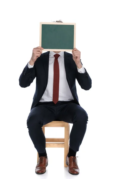 Businessman Hiding His Face Board Sitting White Background — Stock Photo, Image